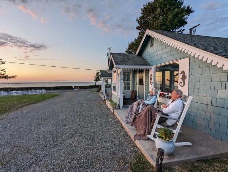 Couple enjoying a sunset from our romantic Sequim Lodging