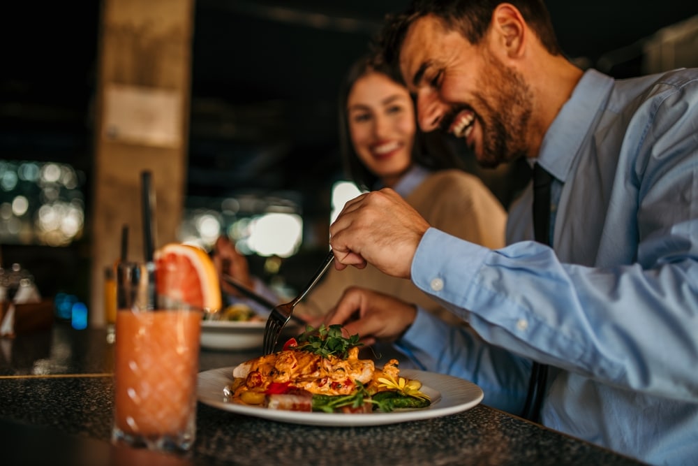 Couple enjoying a delicious meal together at one of the best Sequim Restaurants