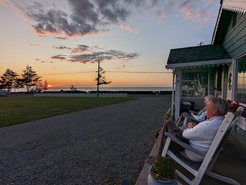 Romantic couple at sunset enjoy our Sequim lodging, one of the best weekend getaways from Seattle