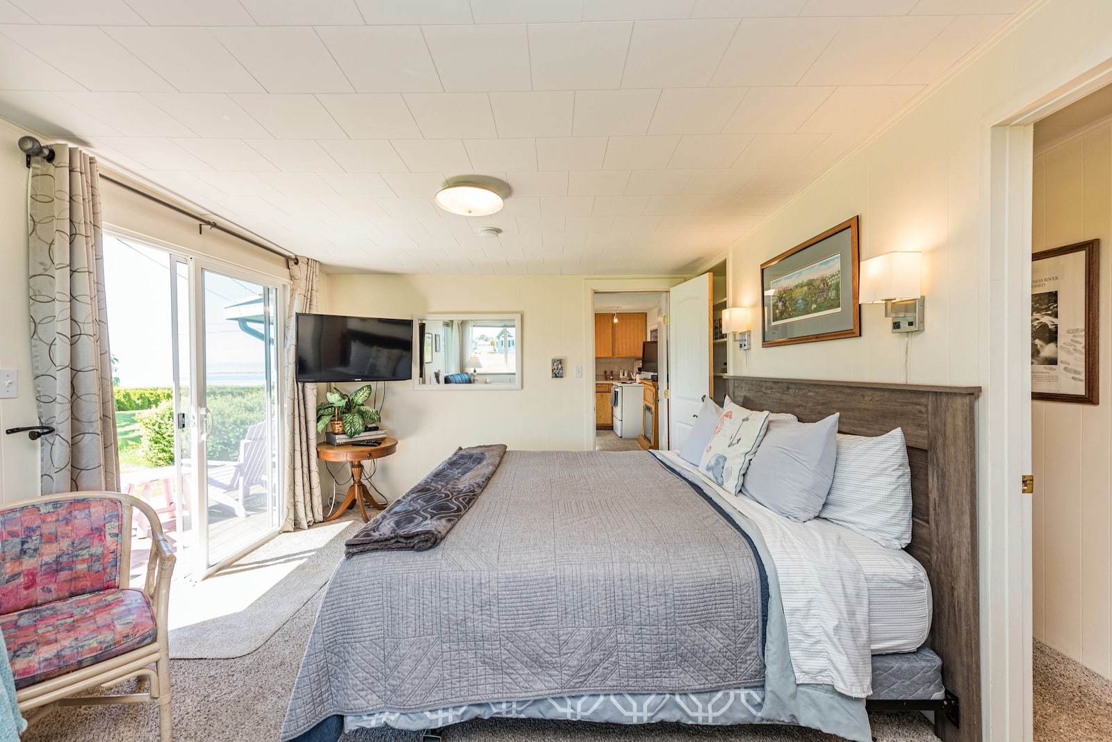 Stay at one of the best Hotels in Sequim, WA and enjoy this cottage with a king sized bed and sliding glass door to the patio. 